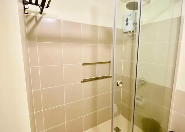 Family-ready Skyline Retreat Near Bgc With Free Parking Aparthotel Manila