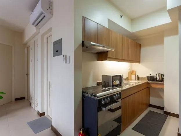 Aparthotel Family-ready Skyline Retreat Near Bgc With Free Parking 4*